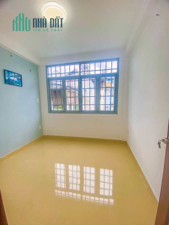 Định Cư Bán Nhà Gấp đường Trần Đình Xu 5lầu 5tỷ900triệu .