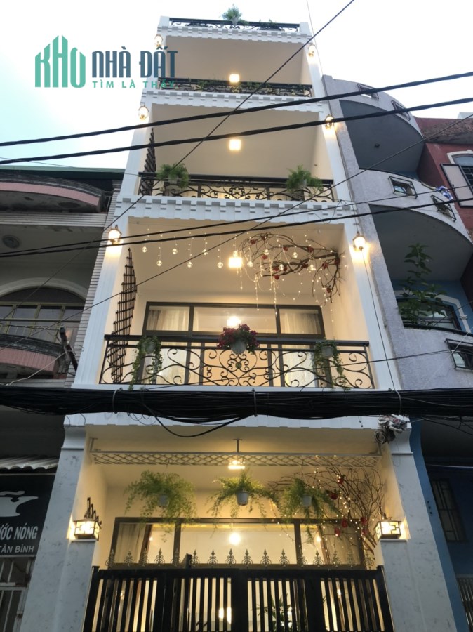 Cho thuê nhà hẻm xe hơi Phan Văn Trị, quận 5, diện tích 3.5mx14m, 4 lầu mới, thích hợp gia đình ở